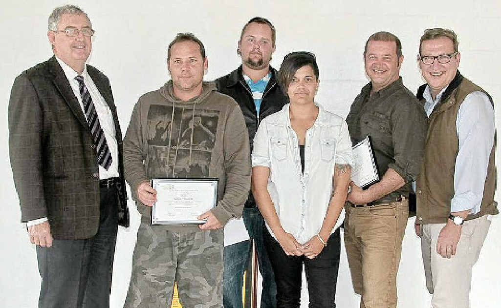 Mayor Ron Dyne with graduates Justyn O’Rourke, Dale Whalley (back), Carly Chilli, project manager Simon Vicic and Member for Gympie David Gibson. Mayor Ron Dyne with graduates Justyn O’Rourke, Dale Whalley (back), Carly Chilli, project manager Simon Vicic and Member for Gympie David Gibson.